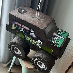 Monster Truck Piñata with Green and Black Design